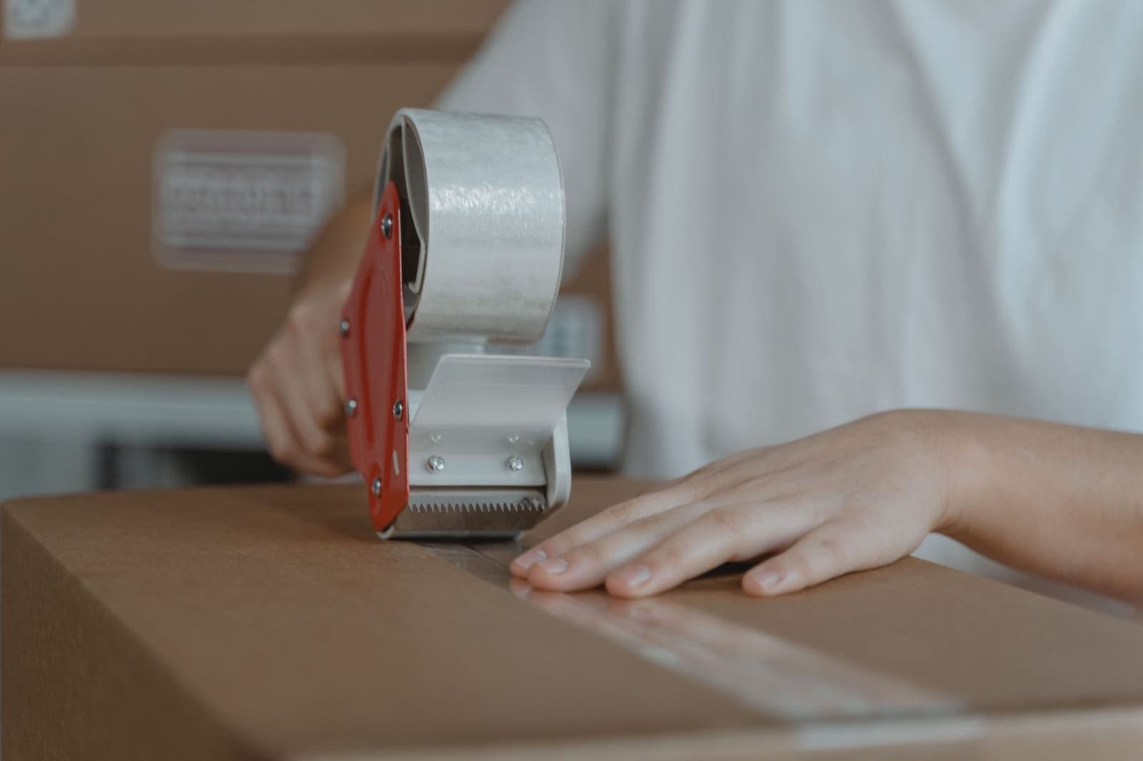 A parcel being packed carefully